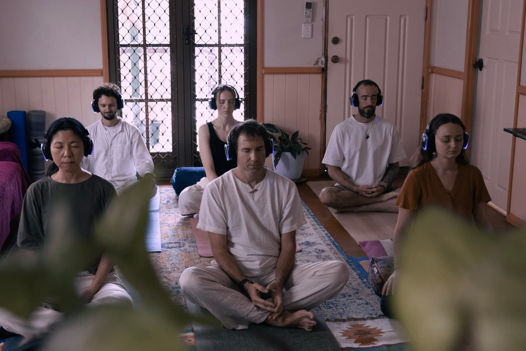 Journey Within attendees meditating with Silent Rave headsets