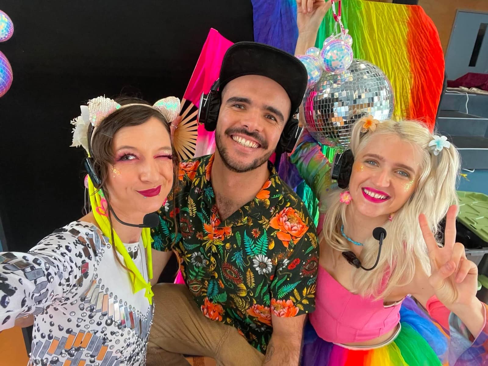 Liberationist and guests posing together at a Silent Rave silent-disco event